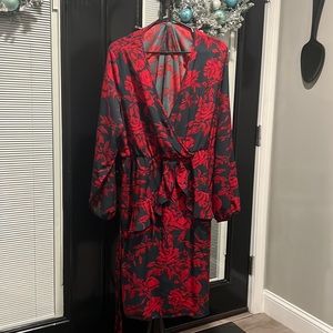 Beautiful, black and red wrap like dress. Never worn.